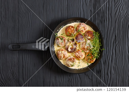 juicy chicken rissoles, cakes in rich cream sauce juicy chicken rissoles, cakes in rich cream sauce 120154139