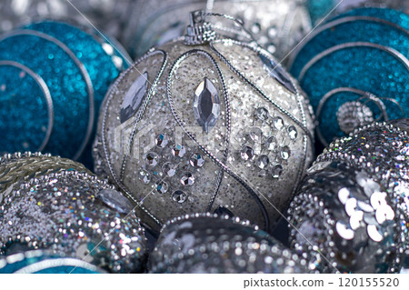 Silver and blue shiny Christmas decorations close up 120155520