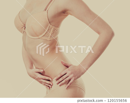 Beautiful slim woman wearing lace lingerie. Beautiful slim woman wearing lace lingerie. 120155656