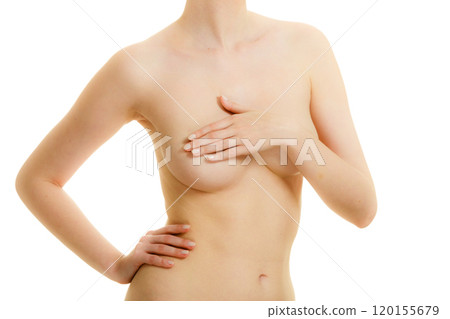 Woman covering her breast with hands Woman covering her breast with hands 120155679