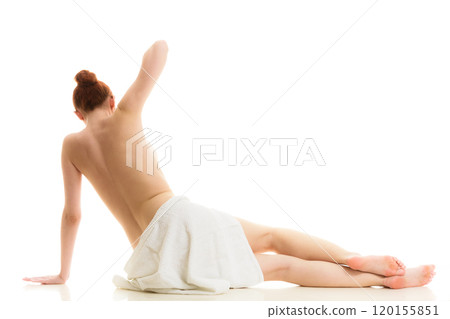 Sitting naked woman in white towel 120155851
