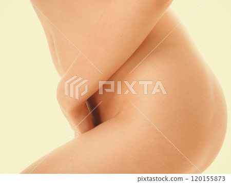 Perfectly naked woman covering her vagin venter. 120155873