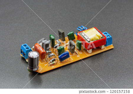 Old electronic component microcircuit closeup. 120157158