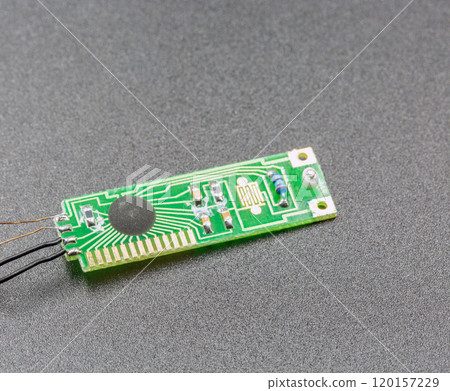 Old electronic component switch chip closeup. 120157229