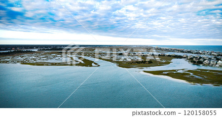 Aerial view over Wrightsville Beach in Wilmington North Carolina 120158055