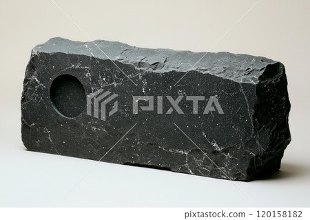 side view reveals simple slate stone tombstone featuring smooth matte finish emphasizing sustainability and minimalism set bright white backdrop. 120158182