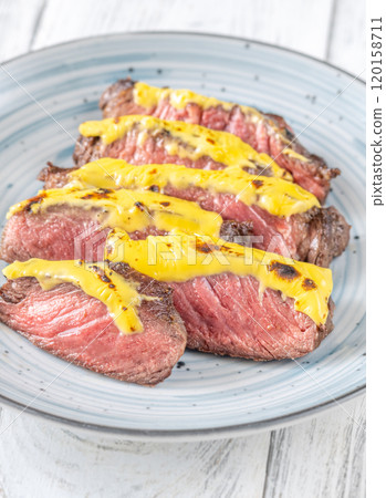 Cheese topped beef steak Cheese topped beef steak 120158711