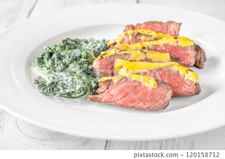 Cheese topped beef steak Cheese topped beef steak 120158712