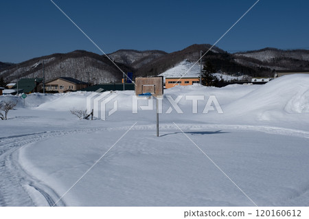 Basketball goal buried in snow in the park Basketball goal buried in snow in the park 120160612