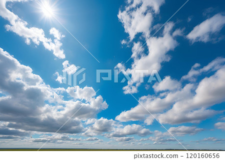 Blue sky with sunlight reflecting off Blue sky with sunlight reflecting off 120160656