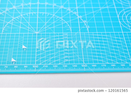 blue cutting mat board on white background with line and scale measure guide pattern for object art blue cutting mat board on white background with line and scale measure guide pattern for object art 120161565