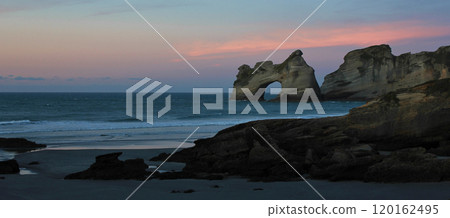 Sunset at Wharariki Beach, New Zealand. Sunset at Wharariki Beach, New Zealand. 120162495