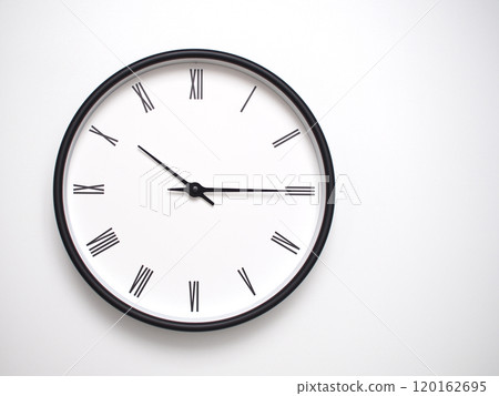 Clock Showing 22.15 or 10.15 with Roman Numerals. Simple Round Clock for Concepts of Time Management and Scheduling. 120162695