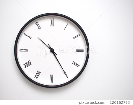 Clock Showing 22.25 or 10.25 with Roman Numerals. Simple Round Clock for Concepts of Time Management and Scheduling. 120162753