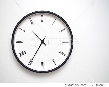 Clock Showing 10.35 or 22.35 with Roman Numerals. Simple Round Clock for Concepts of Time Management and Scheduling. Clock Showing 10.35 or 22.35 with Roman Numerals. Simple Round Clock for Concepts of Time Management and Scheduling. 120162835