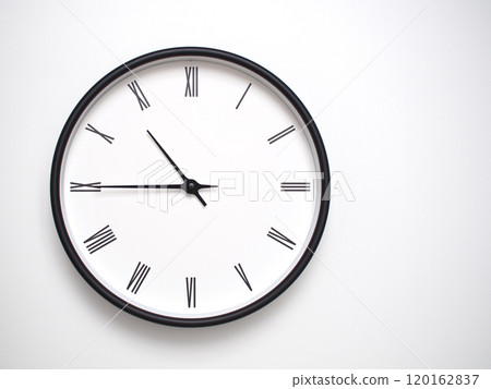 Clock Showing 22.45 or 10.45 with Roman Numerals. Simple Round Clock for Concepts of Time Management and Scheduling. 120162837