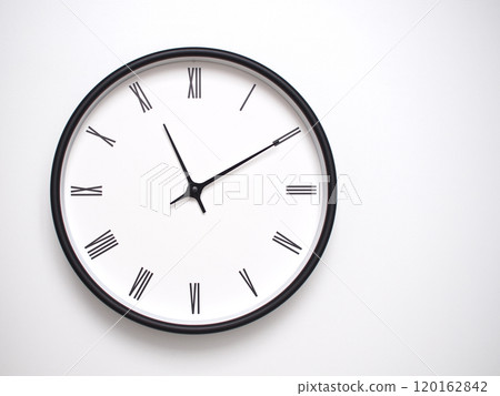 Clock Showing 23.10 or 11.10 with Roman Numerals. Simple Round Clock for Concepts of Time Management and Scheduling. Clock Showing 23.10 or 11.10 with Roman Numerals. Simple Round Clock for Concepts of Time Management and Scheduling. 120162842