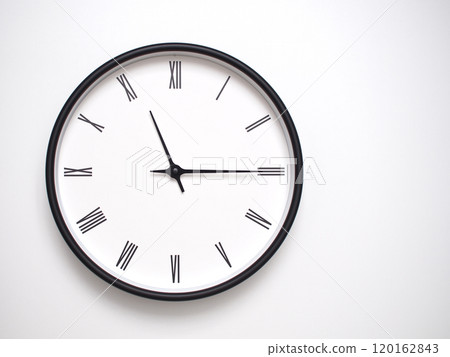 Clock Showing 23.15 or 11.15 with Roman Numerals. Simple Round Clock for Concepts of Time Management and Scheduling. 120162843