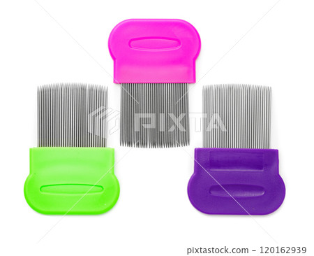 Colorful plastic and metal combs on a white background 120162939