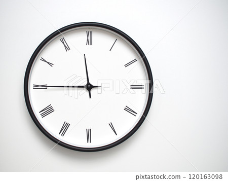 Clock Showing 23.45 or 11.45 with Roman Numerals. Simple Round Clock for Concepts of Time Management and Scheduling. 120163098