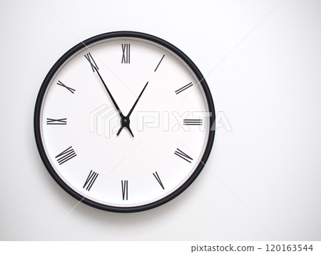 Clock Showing 12.55 or 00.55 with Roman Numerals. Simple Round Clock for Concepts of Time Management and Scheduling. 120163544
