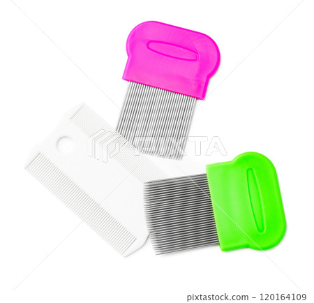 Colorful plastic and metal combs on a white background Colorful plastic and metal combs on a white background 120164109