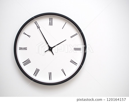 Clock Showing 13.55 or 01.55 with Roman Numerals. Simple Round Clock for Concepts of Time Management and Scheduling. 120164157
