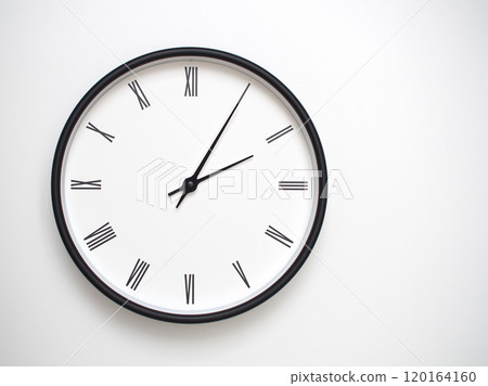 Clock Showing 14.05 or 02.05 with Roman Numerals. Simple Round Clock for Concepts of Time Management and Scheduling. Clock Showing 14.05 or 02.05 with Roman Numerals. Simple Round Clock for Concepts of Time Management and Scheduling. 120164160