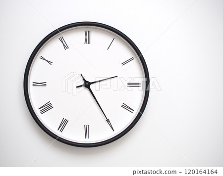 Clock Showing 14.25 or 02.25 with Roman Numerals. Simple Round Clock for Concepts of Time Management and Scheduling. 120164164