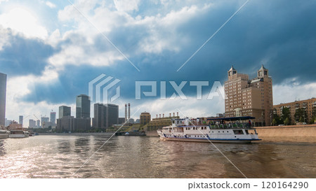 Cruise ship sails on the Moscow river in Moscow city center, popular place for walking. Cruise ship sails on the Moscow river in Moscow city center, popular place for walking. 120164290