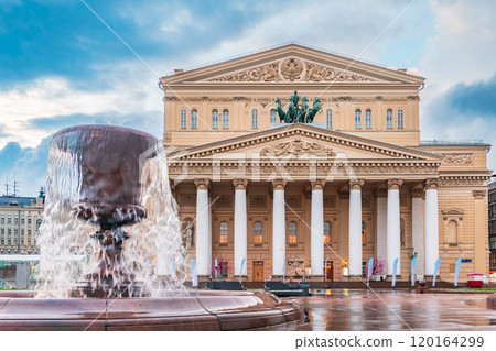 Fountain at Bolshoi theatre (Big theatre) in Moscow, Russia. Daylight view of the Bolshoi theatre in Moscow, Russia 120164299