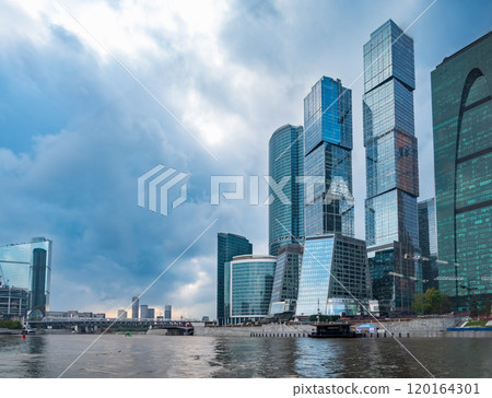 High buildings of Moscow-City, view from cruise ship and Moskva River at summer day, Russia. High buildings of Moscow-City, view from cruise ship and Moskva River at summer day, Russia. 120164301