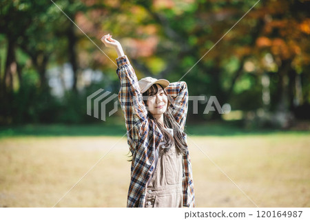 Young woman taking a break at holiday camp 120164987