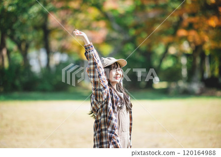 Young woman taking a break at holiday camp 120164988