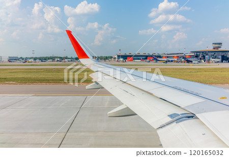 View from the airplane window during takeoff at Sheremetyevo airport at summer 120165032