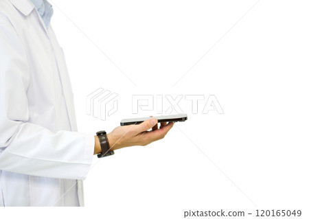 A doctor in a white lab coat holding smartphone with his hand. Portrait on white background, studio shot. A doctor in a white lab coat holding smartphone with his hand. Portrait on white background, studio shot. 120165049
