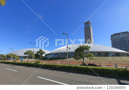View of Anabuki Arena Kagawa (Kagawa Prefectural Arena), nearing completion at Sunport Takamatsu, from the Seafront Promenade View of Anabuki Arena Kagawa (Kagawa Prefectural Arena), nearing completion at Sunport Takamatsu, from the Seafront Promenade 120166005
