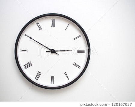 Clock Showing 14.50 or 02.50 with Roman Numerals. Simple Round Clock for Concepts of Time Management and Scheduling. 120167037