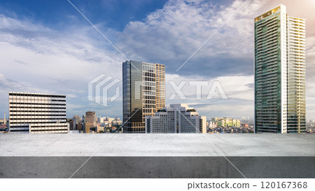 Empty rooftop with view of modern building skyscrapers and futuristic architecture with blue sky background Empty rooftop with view of modern building skyscrapers and futuristic architecture with blue sky background 120167368