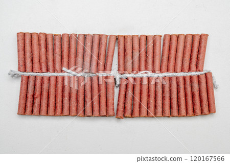 Red fire crackers string isolated over white background Red fire crackers string isolated over white background 120167566