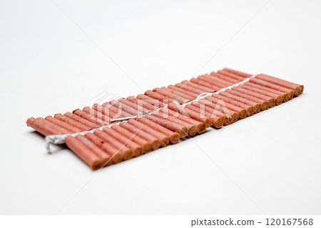 Red fire crackers string isolated over white background Red fire crackers string isolated over white background 120167568