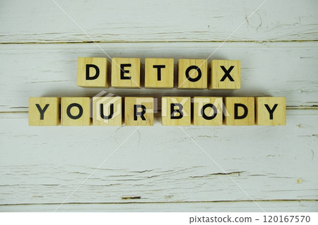 Detox Your Boday with wooden blocks alphabet letters on wooden background Detox Your Boday with wooden blocks alphabet letters on wooden background 120167570
