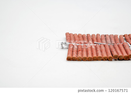 Red fire crackers string isolated over white background 120167571