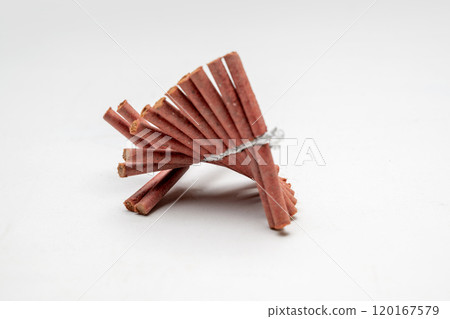Red fire crackers string isolated over white background Red fire crackers string isolated over white background 120167579