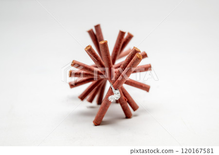 Red fire crackers string isolated over white background 120167581