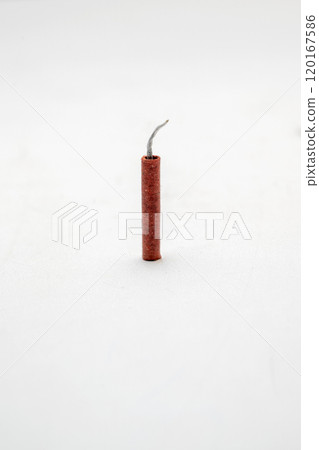 Red fire crackers isolated over white background Red fire crackers isolated over white background 120167586
