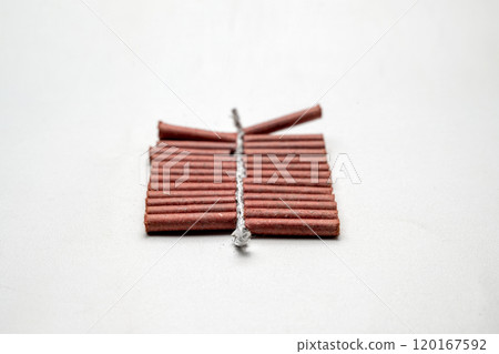 Red fire crackers string isolated over white background Red fire crackers string isolated over white background 120167592