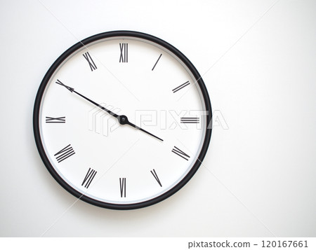 Clock Showing 15.50 or 03.50 with Roman Numerals. Simple Round Clock for Concepts of Time Management and Scheduling. Clock Showing 15.50 or 03.50 with Roman Numerals. Simple Round Clock for Concepts of Time Management and Scheduling. 120167661