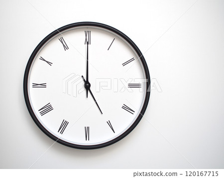 Clock Showing 17.00 or 05.00 with Roman Numerals. Simple Round Clock for Concepts of Time Management and Scheduling. Clock Showing 17.00 or 05.00 with Roman Numerals. Simple Round Clock for Concepts of Time Management and Scheduling. 120167715