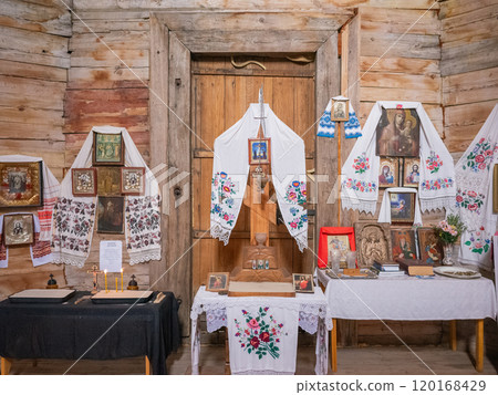 [Ukraine] Icons displayed inside a wooden Orthodox church on the outskirts of Chernihiv 120168429